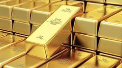 الذهب يهبط مع تمسك الدولار بمكاسبه