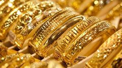 تراجع الذهب بضغط من قوة الدولار