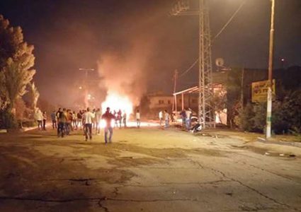 إصابة مواطنين في حريق مخبر وسط مدينة قلقيلية