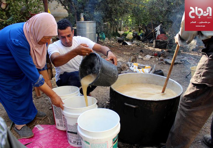 صناعة الحلوى التقليدية "الملبن" في قرية حلحول بالخليل