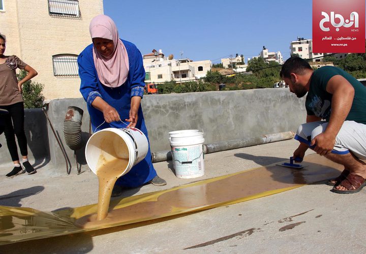 صناعة الحلوى التقليدية "الملبن" في قرية حلحول بالخليل