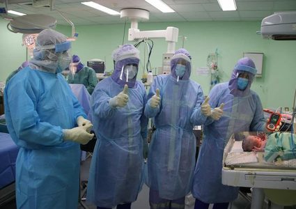 غزة: سيدة مصابة بفيروس كورونا تضع مولودها الأول