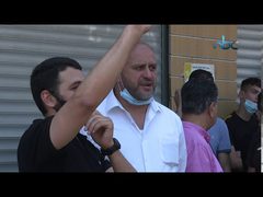 وقفة احتجاجية في رام الله رفضاً لقرار تمديد الإغلاق لبعض القطاعات