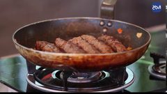 الكباب الحلبي مع الأرز وصوص البندورة