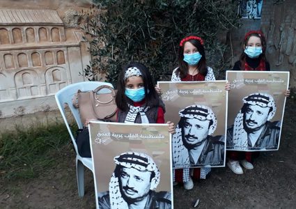 أشبال وزهرات فتح يوقدون الشموع في ذكرى استشهاد أبو عمار