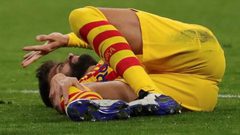 برشلونة يعلن إصابة بيكيه وروبيرتو