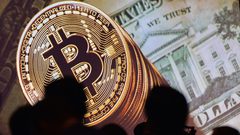 ارتفاع عملتين رقميتين مع تقدم "بتكوين"