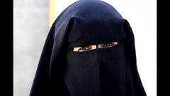 النقاب لا يغني عن ارتداء الكمامة