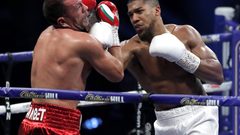 جوشوا يهزم بوليف بالضربة القاضية ويحتفظ بألقابه في الوزن الثقيل