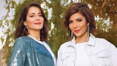 أصالة وابنتها في أحدث ظهور لهما من الطائرة