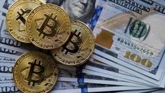 الدولار يقلص خسائره في ظل ارتفاع العوائد و"بتكوين" تتراجع
