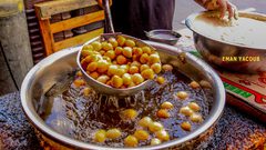 العوامة أو الزنغل الكرماوية، من أشهى الحلويات في رمضان - تصوير إيمان يعقوب