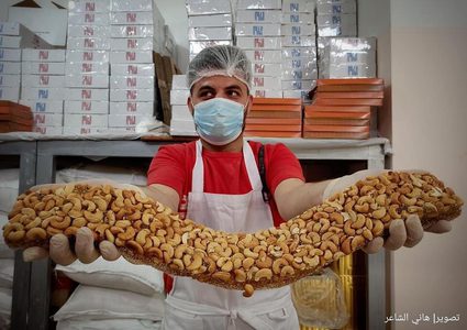 ‎مصانع الحلقوم بغزة تجهز منتجاتها قبيل عيد الفطر