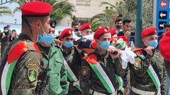 مراسم عسكرية في وداع الشهيد عودة