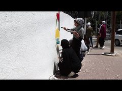 غزة.. مواطنون يرسمون جداريات تضامنا مع الشيخ جراح