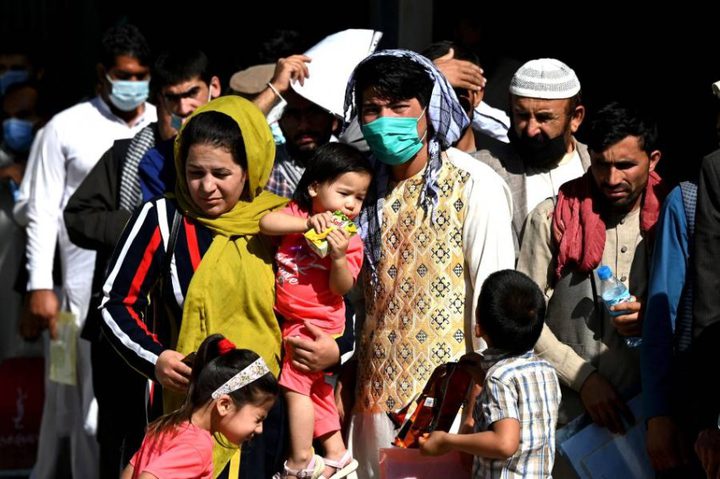 إدارة بايدن تعيد توطين أكثر من 55 ألف لاجئي أفغاني