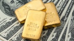 الدولار يرتفع والذهب يهبط بحدة بعد نشر محضر اجتماع المركزي الأميركي