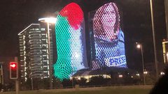 اضاءة أبراج لوسيل في العاصمة القطرية الدوحة بصورة شيرين أبو عاقلة والعلم الفلسطيني