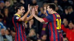 تشافي يطلب من لابورتا إعادة ميسي