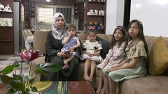 زوجة المعتقل عواودة: "يتحدث بصعوبة بالغة ولا يتذكر أسماء بناته"