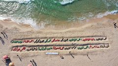 تدشين أكبر منحوتة رملية في فلسطين تضم أسماء الأطفال الذين ارتقوا في العدوان الأخير على غزة