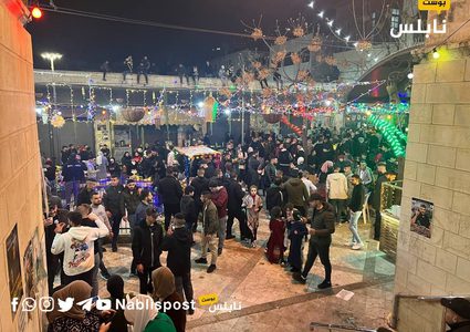 من الأجواء الرمضانية في باب الساحة بالبلدة القديمة وسط نابلس