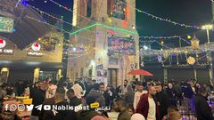 من الأجواء الرمضانية في باب الساحة بالبلدة القديمة وسط نابلس