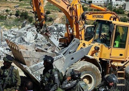 سلطات الاحتلال تهدم بناية سكنية في بلدة سلوان