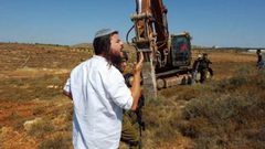 مستوطنون يجرفون أراضي في قريتي قصرة وجالود جنوب نابلس