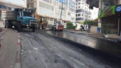 بلدية نابلس تزيل آثار عدوان الاحتلال في رفيديا إثر اقتحام الليلة الماضية