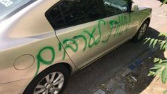 الاحتلال يعتقل أسيرا محررا ومستوطنون يحرقون مركبة في المغير