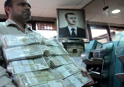 المركزي السوري يرفع سعر الدولار