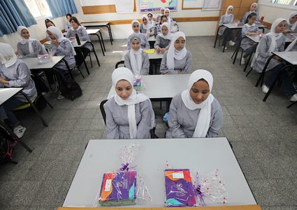 عودة الطلاب إلى مدارسهم صباح اليوم الأول من العام الدراسي الجديد في مدينة غزة