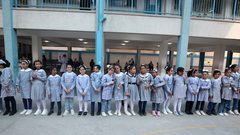 عودة الطلاب إلى مدارسهم صباح اليوم الأول من العام الدراسي الجديد في مدينة غزة