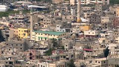 المجموعات المسلحة تخرق وقف إطلاق النار في مخيم عين الحلوة