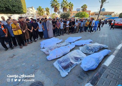 من وداع شهداء المجازر التي نفذها الاحتلال وسط قطاع غزة.