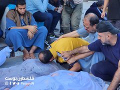 من وداع شهداء المجازر التي نفذها الاحتلال وسط قطاع غزة.