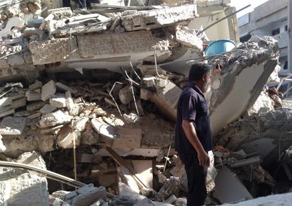 بقصف عنيف:تدمير برج الأندلس في محيط منطقة ميناء غزة