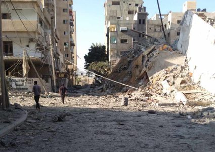 بقصف عنيف:تدمير برج الأندلس في محيط منطقة ميناء غزة