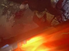 من أمام المنزل الذي استهدفه طيران الاحتلال في مخيم بلاطة شرق نابلس.