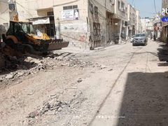 بلدية جنين والاشغال تشرعان بإزالة آثار الدمار التي خلفتها قوات الاحتلال