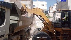 بلدية جنين والاشغال تشرعان بإزالة آثار الدمار التي خلفتها قوات الاحتلال