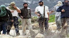 مستوطنون يرسمون رموز الاحتلال في مناطق متعددة بأريحا