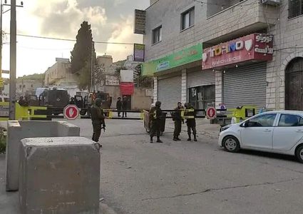 نابلس: الاحتلال يجبر المحلات التجارية في حوارة على إغلاق أبوابها
