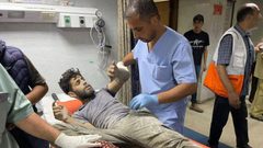 شهيد وإصابات بقصف الاحتلال مبنى الهلال الأحمر في خان يونس