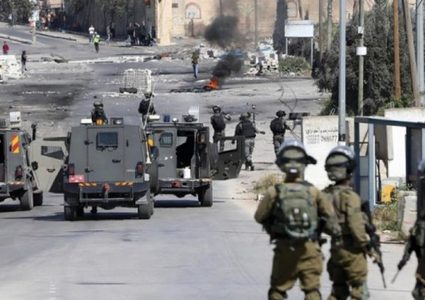 إصابة طفل وشاب برصاص الاحتلال الحي واعتقال آخرين والاستيلاء على أموال من الظاهري