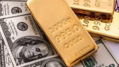 الذهب يتراجع بضغط من قوة الدولار