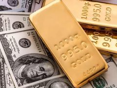 الذهب يتراجع بضغط من قوة الدولار