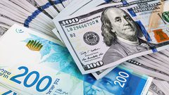 الدولار يواصل تراجعه ويقترب من مستوى 3 شواقل