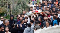 اعتداء على مشيّعي شهيدي المغير شرق رام الله وإطلاق نار خلال الجنازة